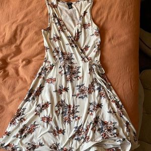 white tank dress w/ florals, criss cross top & tie detail at waist size medium